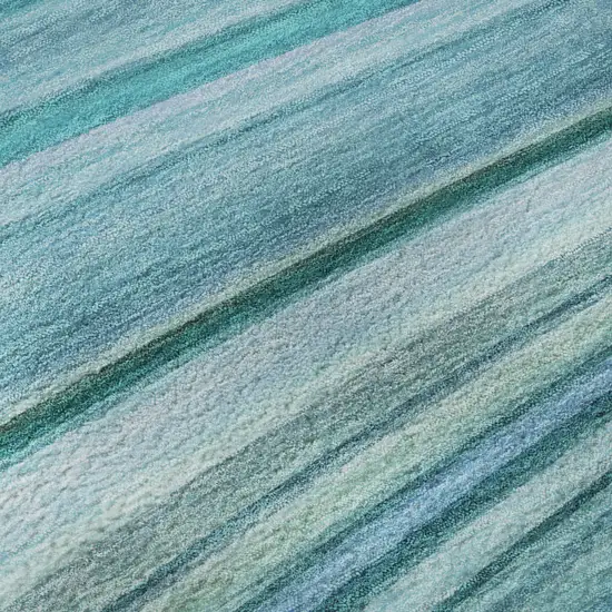 8' Teal And Ivory Abstract Washable Round Rug With UV Protection Photo 9