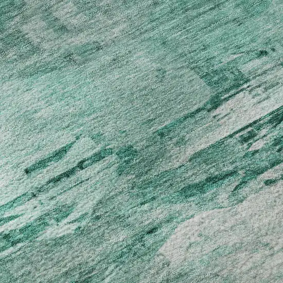 8' Teal And Ivory Abstract Washable Round Rug With UV Protection Photo 9