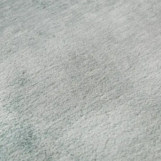 8' Teal And Ivory Abstract Washable Round Rug With UV Protection Photo 9