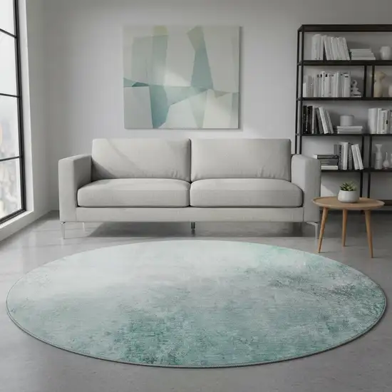 8' Teal And Ivory Abstract Washable Round Rug With UV Protection Photo 2