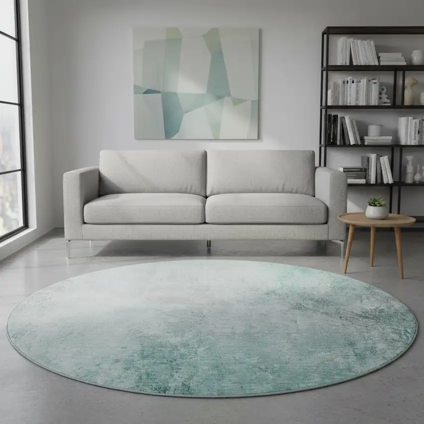8' Teal And Ivory Abstract Washable Round Rug With UV Protection Photo 2