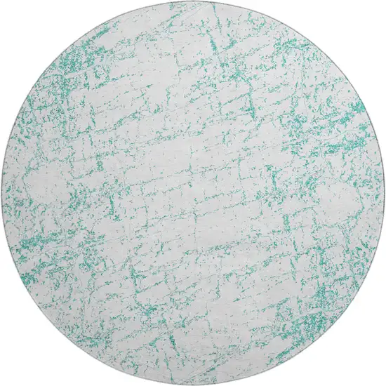 8' Teal And Ivory Abstract Washable Round Rug With UV Protection Photo 1