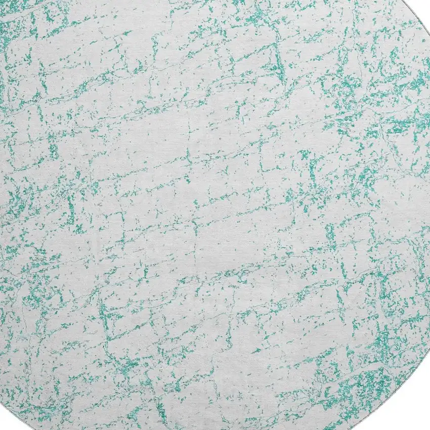 8' Teal And Ivory Abstract Washable Round Rug With UV Protection Photo 2
