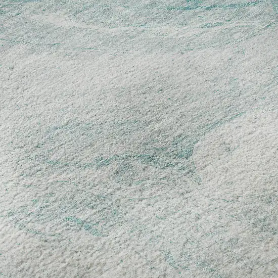 8' Teal And Ivory Abstract Washable Round Rug With UV Protection Photo 9