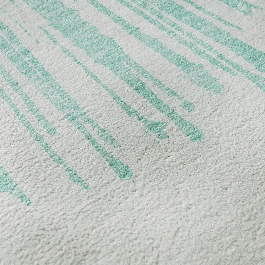 8' Teal And Ivory Abstract Washable Round Rug With UV Protection Photo 8