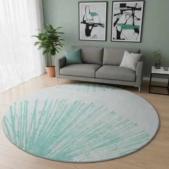 8' Teal And Ivory Abstract Washable Round Rug With UV Protection Photo 2