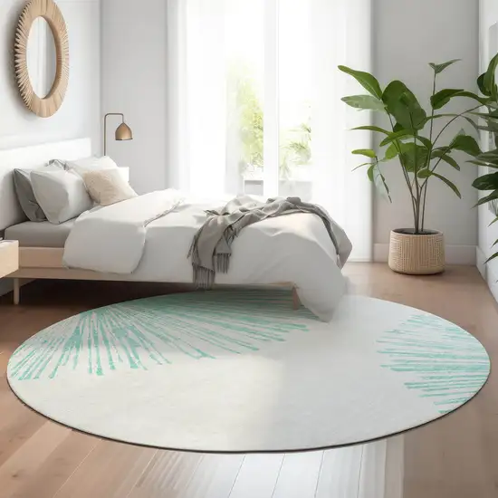 8' Teal And Ivory Abstract Washable Round Rug With UV Protection Photo 4