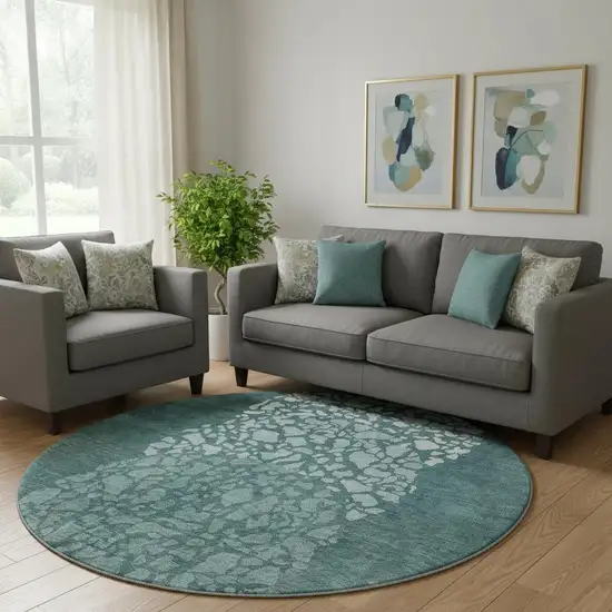 8' Teal And Ivory Abstract Washable Round Rug With UV Protection Photo 1