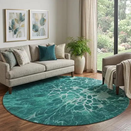 8' Teal And Ivory Abstract Washable Round Rug With UV Protection Photo 1
