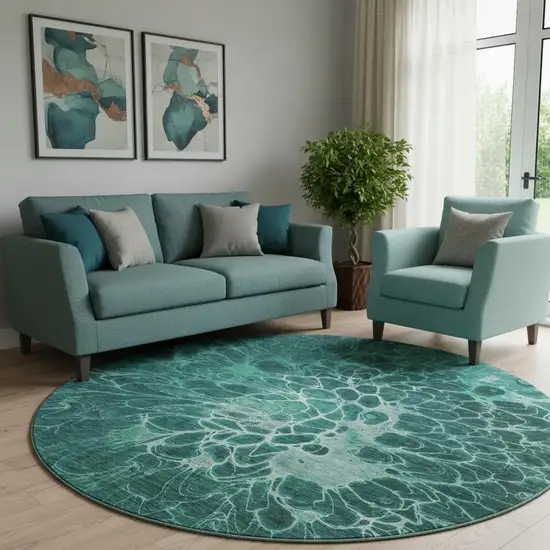 8' Teal And Ivory Abstract Washable Round Rug With UV Protection Photo 1