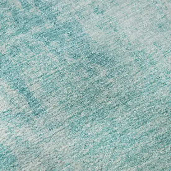 8' Teal And Ivory Abstract Washable Round Rug With UV Protection Photo 9