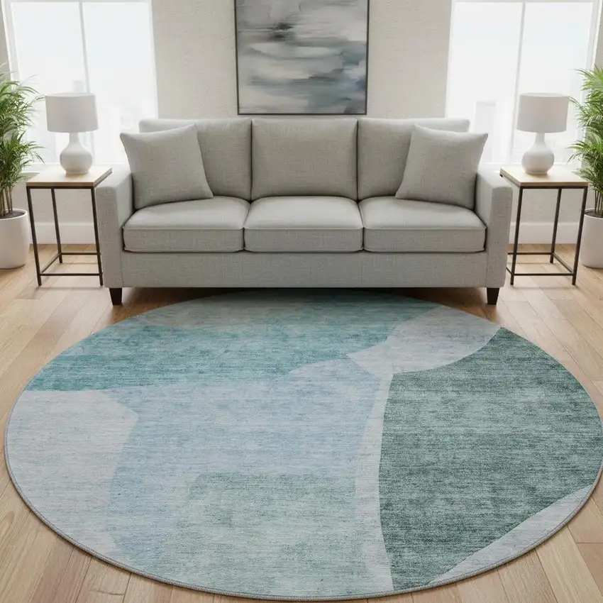 8' Teal And Ivory Abstract Washable Round Rug With UV Protection Photo 2