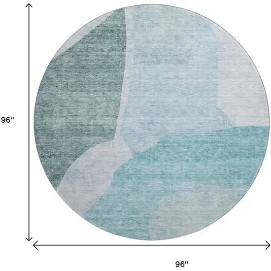 8' Teal And Ivory Abstract Washable Round Rug With UV Protection Photo 9