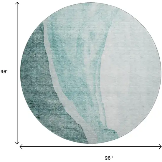 8' Teal And Ivory Abstract Washable Round Rug With UV Protection Photo 9