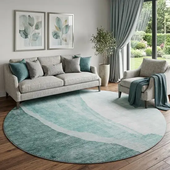 8' Teal And Ivory Abstract Washable Round Rug With UV Protection Photo 1