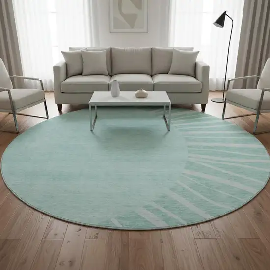 8' Teal And Ivory Abstract Washable Round Rug With UV Protection Photo 2