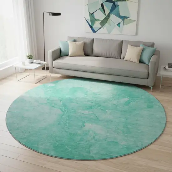 8' Teal And Ivory Abstract Washable Round Rug With UV Protection Photo 2