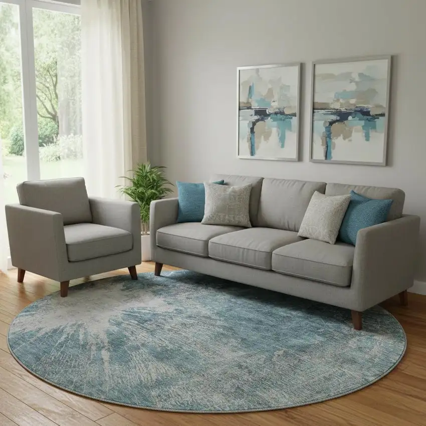 8' Teal And Ivory Abstract Washable Round Rug With UV Protection Photo 1