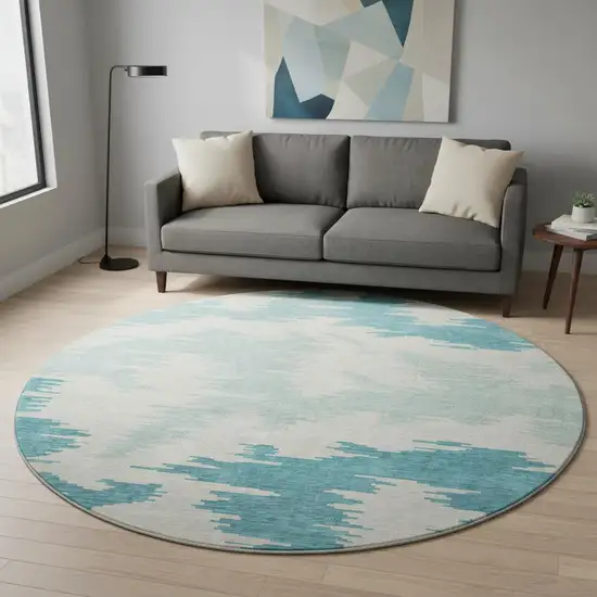 8' Teal And Ivory Abstract Washable Round Rug With UV Protection Photo 2