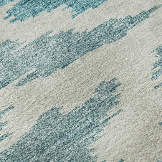 8' Teal And Ivory Abstract Washable Round Rug With UV Protection Photo 8