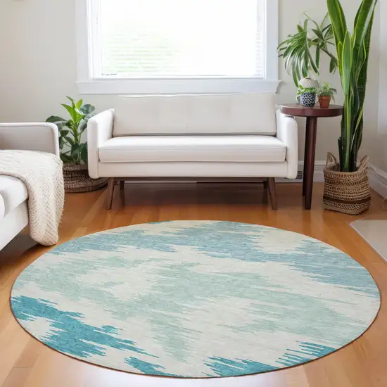 8' Teal And Ivory Abstract Washable Round Rug With UV Protection Photo 4