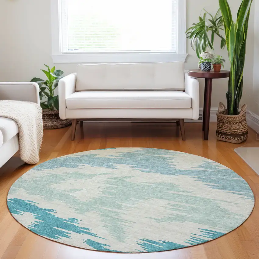 8' Teal And Ivory Abstract Washable Round Rug With UV Protection Photo 4