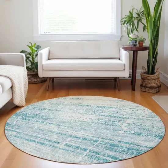 8' Teal And Ivory Abstract Washable Round Rug With UV Protection Photo 5