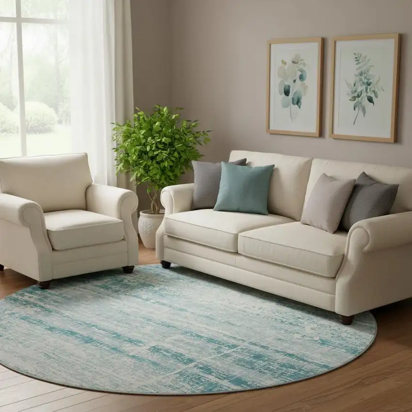 8' Teal And Ivory Abstract Washable Round Rug With UV Protection Photo 1