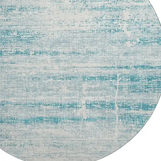 8' Teal And Ivory Abstract Washable Round Rug With UV Protection Photo 3