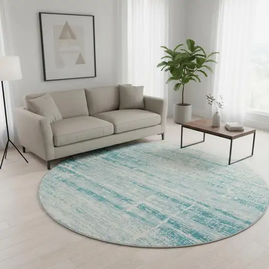 8' Teal And Ivory Abstract Washable Round Rug With UV Protection Photo 2