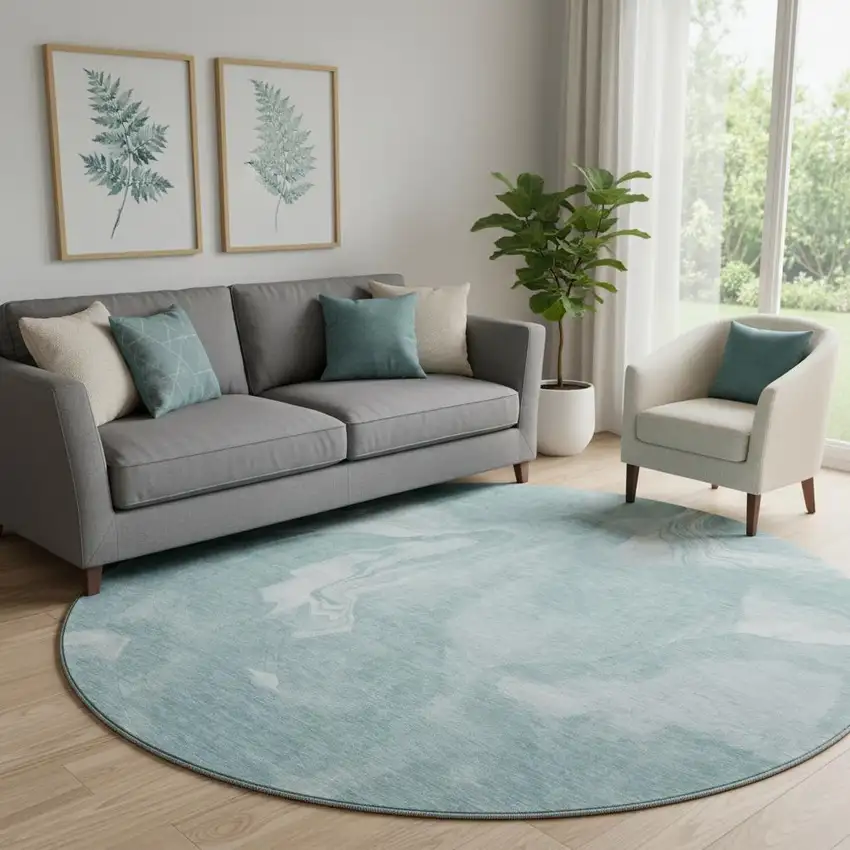 8' Teal And Ivory Abstract Washable Round Rug With UV Protection Photo 1