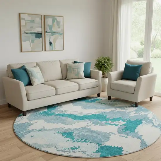 8' Teal And Ivory Abstract Washable Round Rug With UV Protection Photo 1