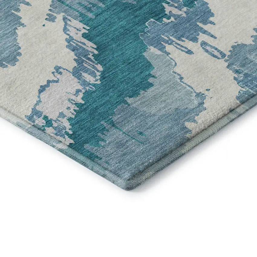 8' Teal And Ivory Abstract Washable Round Rug With UV Protection Photo 7