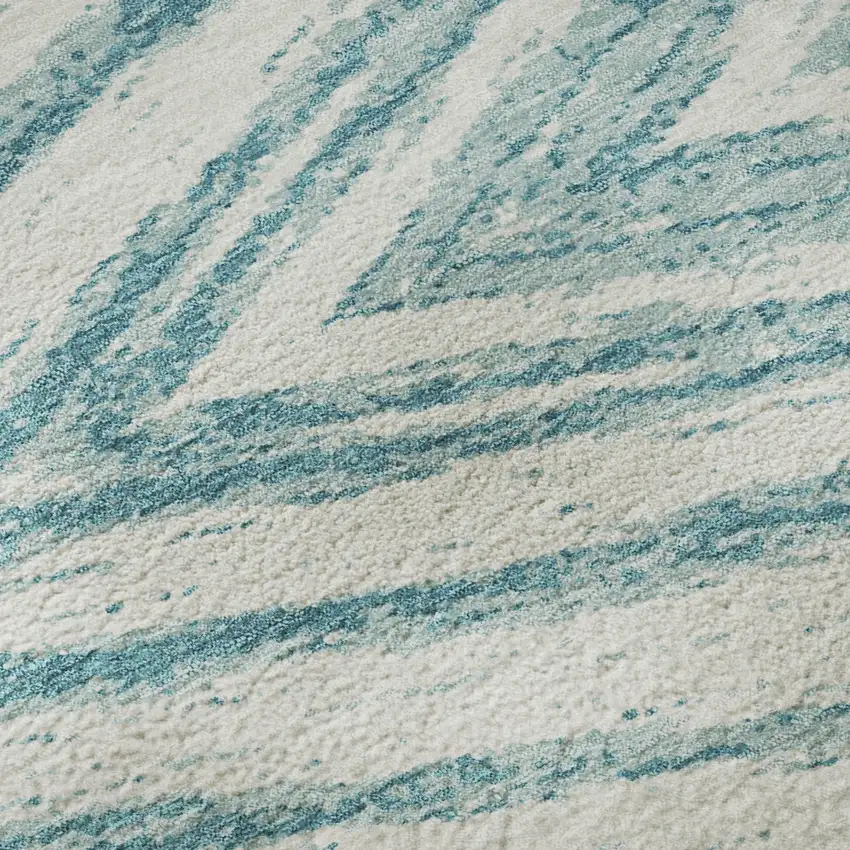 8' Teal And Ivory Abstract Washable Round Rug With UV Protection Photo 9