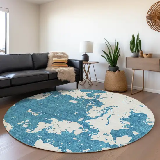 8' Teal And Ivory Abstract Washable Round Rug With UV Protection Photo 5