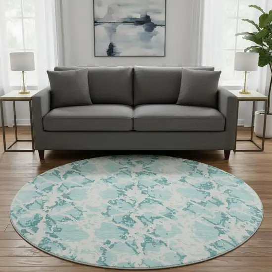 8' Teal And Ivory Abstract Washable Round Rug With UV Protection Photo 2