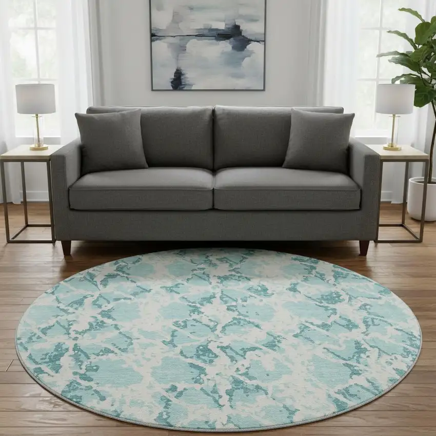 8' Teal And Ivory Abstract Washable Round Rug With UV Protection Photo 2