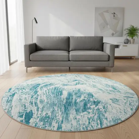 8' Teal And Ivory Abstract Washable Round Rug With UV Protection Photo 2