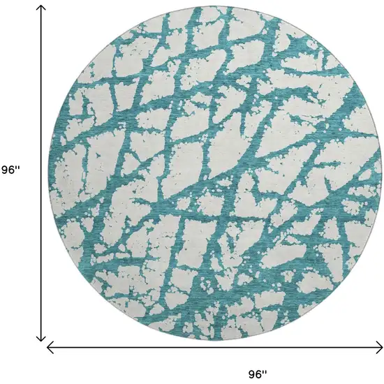 8' Teal And Ivory Abstract Washable Round Rug With UV Protection Photo 9