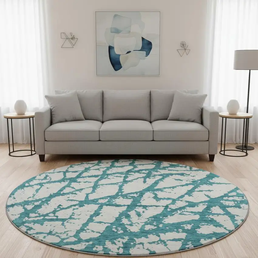 8' Teal And Ivory Abstract Washable Round Rug With UV Protection Photo 2