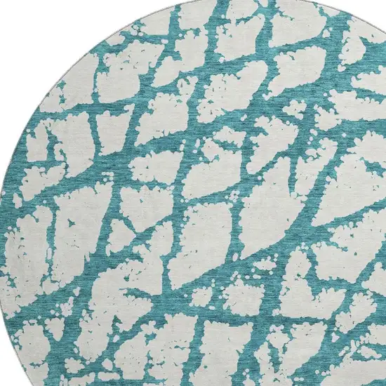 8' Teal And Ivory Abstract Washable Round Rug With UV Protection Photo 2