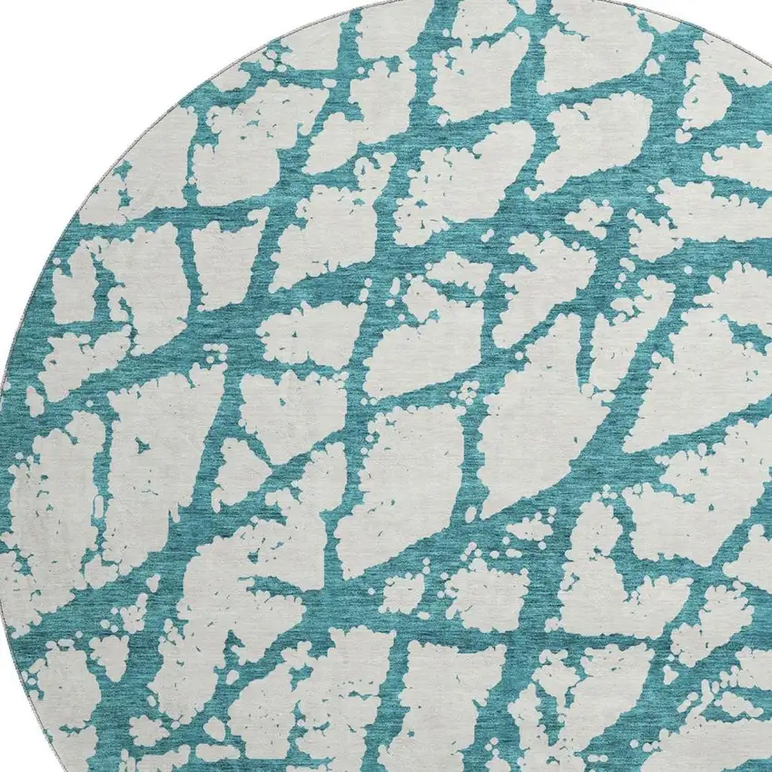 8' Teal And Ivory Abstract Washable Round Rug With UV Protection Photo 2