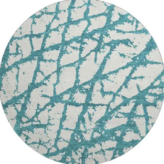 8' Teal And Ivory Abstract Washable Round Rug With UV Protection Photo 3