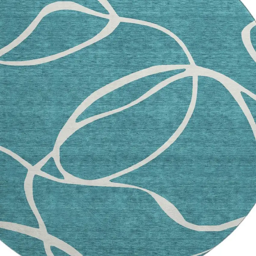 8' Teal And Ivory Abstract Washable Round Rug With UV Protection Photo 2