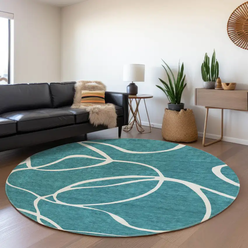 8' Teal And Ivory Abstract Washable Round Rug With UV Protection Photo 5