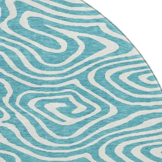 8' Teal And Ivory Abstract Washable Round Rug With UV Protection Photo 2