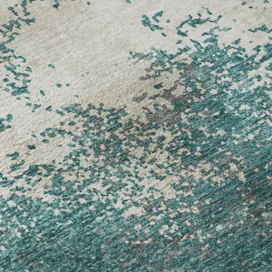 8' Teal And Ivory Abstract Washable Round Rug With UV Protection Photo 8