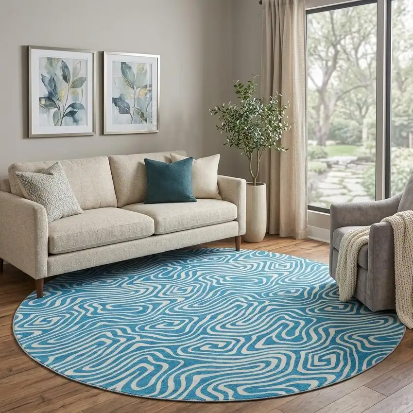 8' Teal And Ivory Abstract Washable Round Rug With UV Protection Photo 1