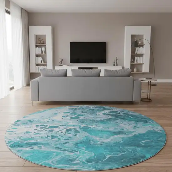 8' Teal And Ivory Abstract Washable Round Rug With UV Protection Photo 2