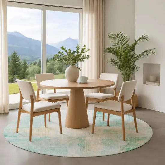 8' Teal And Ivory Abstract Washable Round Rug With UV Protection Photo 4
